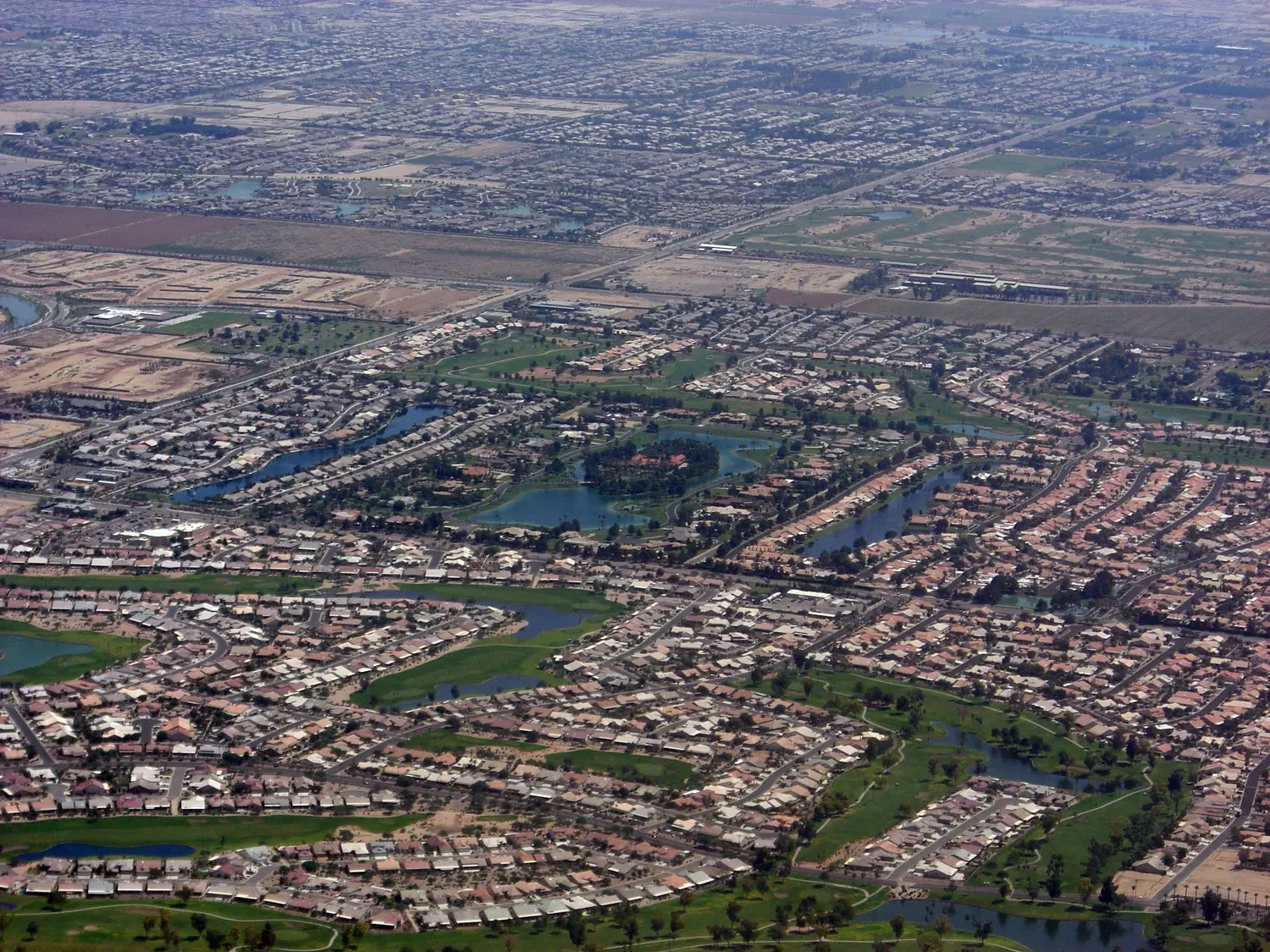 Aerial view of Chandler, Arizona with the mountains beyond